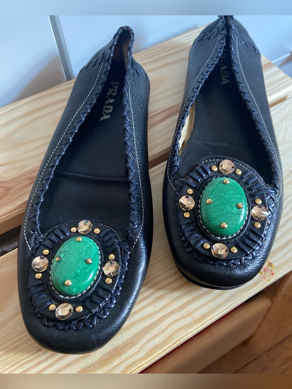 Prada Black Leather Flats with Green Stone and Gold Accents